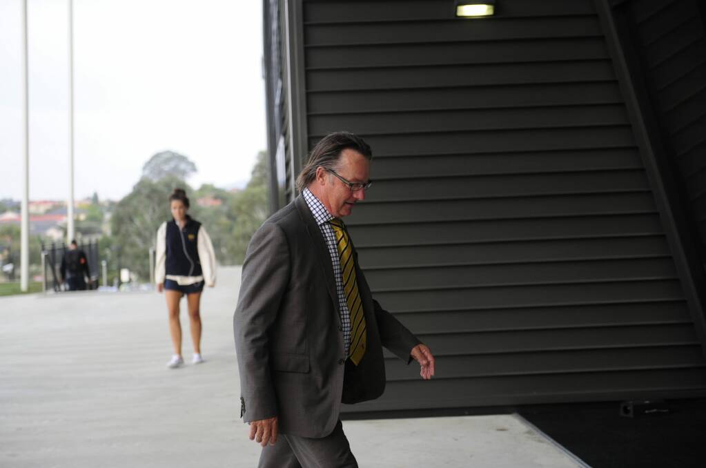 Easts president Greg Dennis arrives at Wednesday's meeting of the clubs and Michael Jones. Photo: Melissa Adams 
