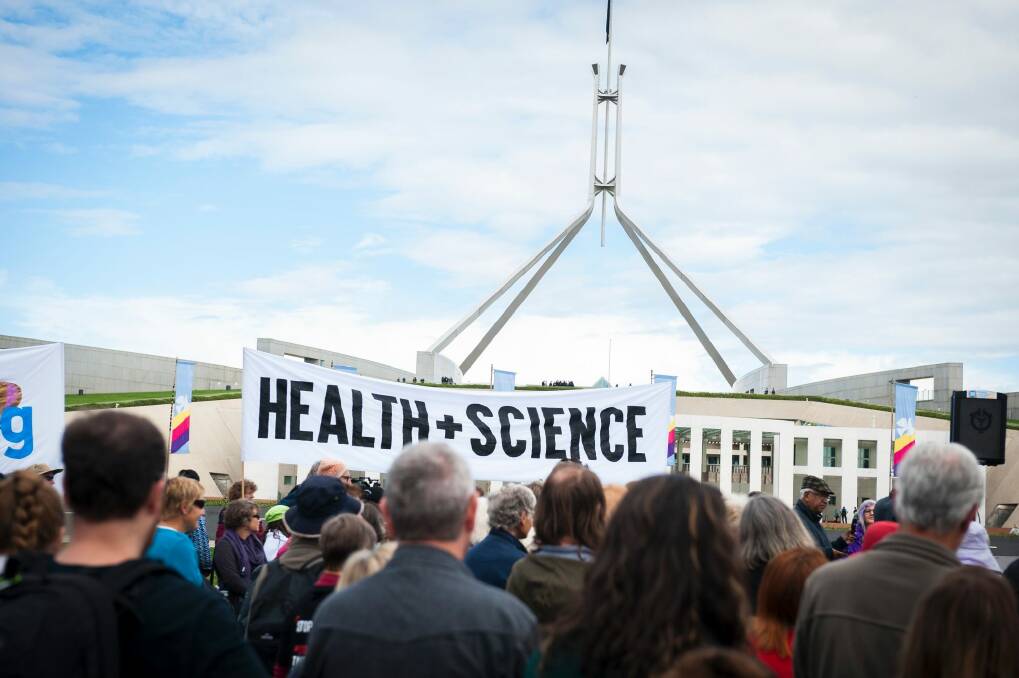 Protesters gather outside Parliament House for the March for Science. Photo: Dion Georgopoulos