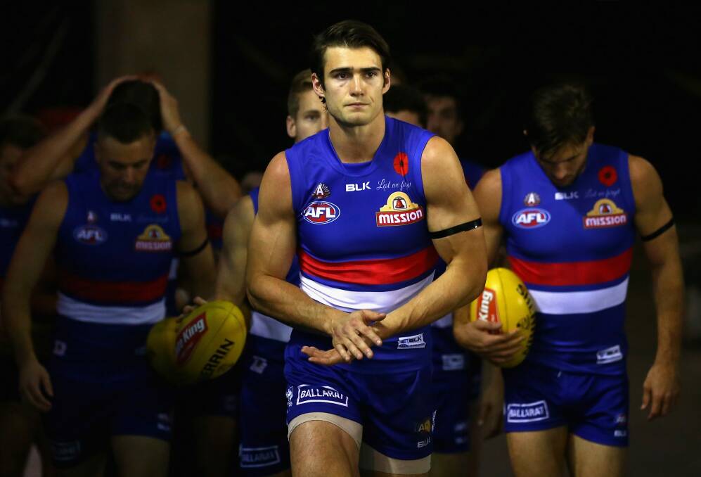Easton Wood leads the Bulldogs onto the ground. Photo: Getty Images