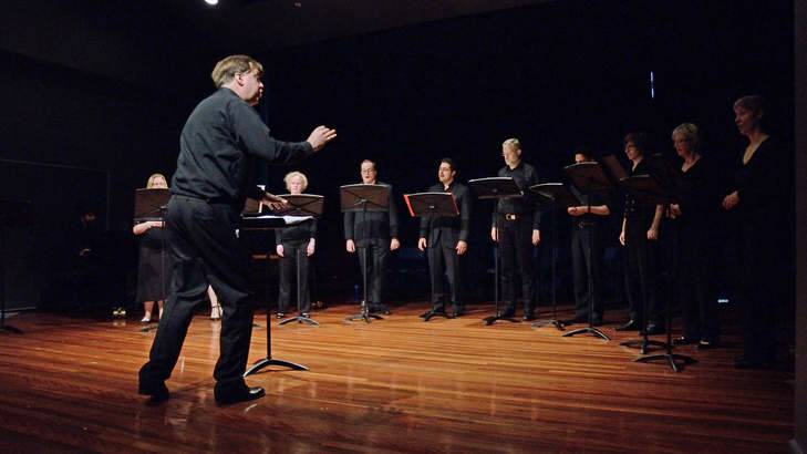 Nicholas Smith conducting Coro in <em>The Yellow River Project</em>. Photo: Peter Hislop