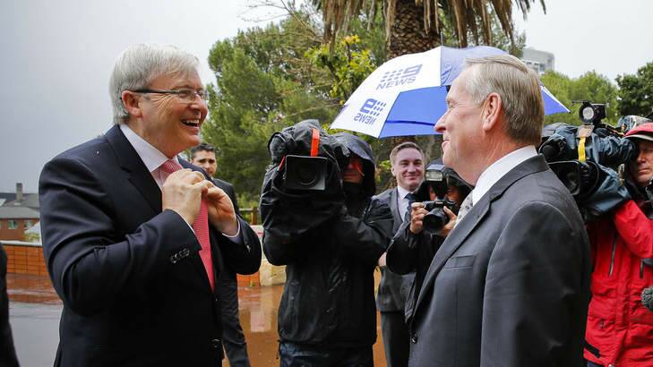 Prime Minister Kevin Rudd arrives at a West Perth office to meet with the Western Australian Premier Colin Barnett on Friday.
