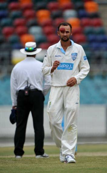 Frustrated: NSW spin bowler Nathan Lyon thought had had Shaun Marsh trapped LBW on 100. Photo: Graham Tidy