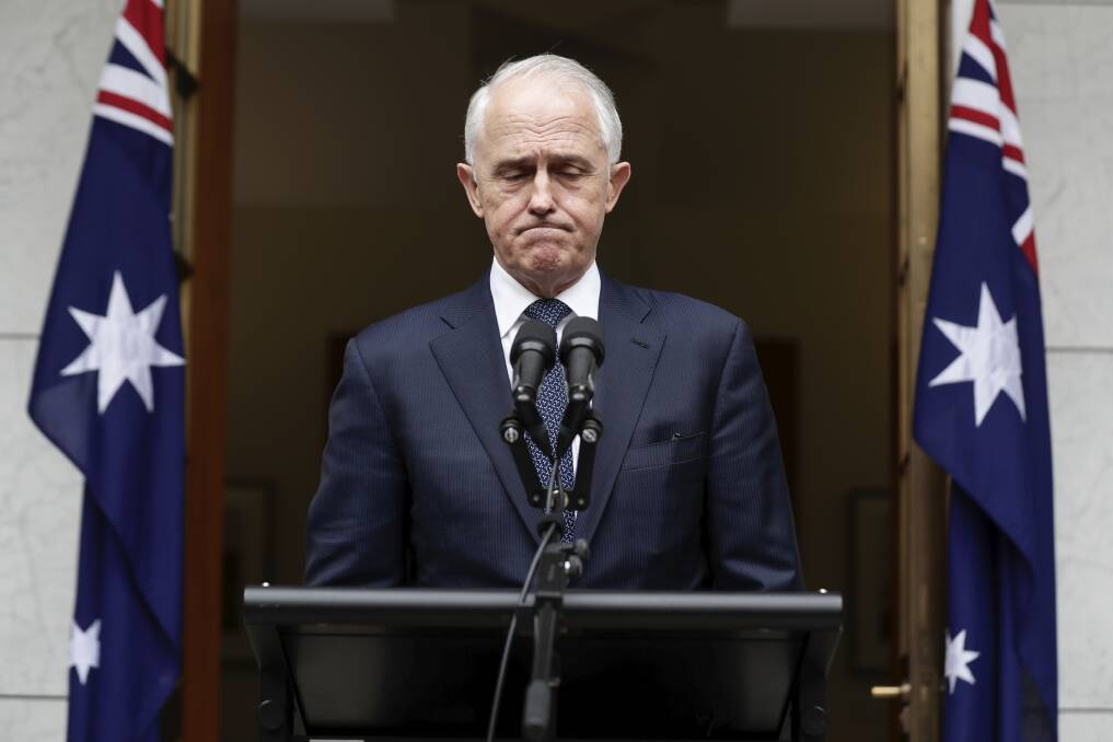 Prime Minister Malcolm Turnbull announces he would hold a special party room meeting on Friday should his enemies gather the signatures of at least 43 Liberal MPs. Photo: Alex Ellinghausen