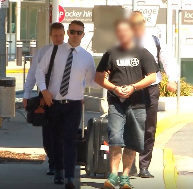 A 33-year-old man arrives in Brisbane after being extradited from Sydney last week. Photo: Queensland Police Service