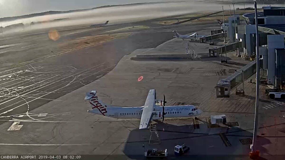 Flights at Canberra Airport have been cancelled and delayed due to fog in Sydney. Photo: Airport Webcams