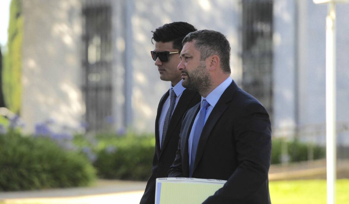 Jordan Sharma with his lawyer Kamy Saeedi. Sharma has been accused of an assault which broke another man's jaw during New Year's celebrations. Photo: Graham Tidy