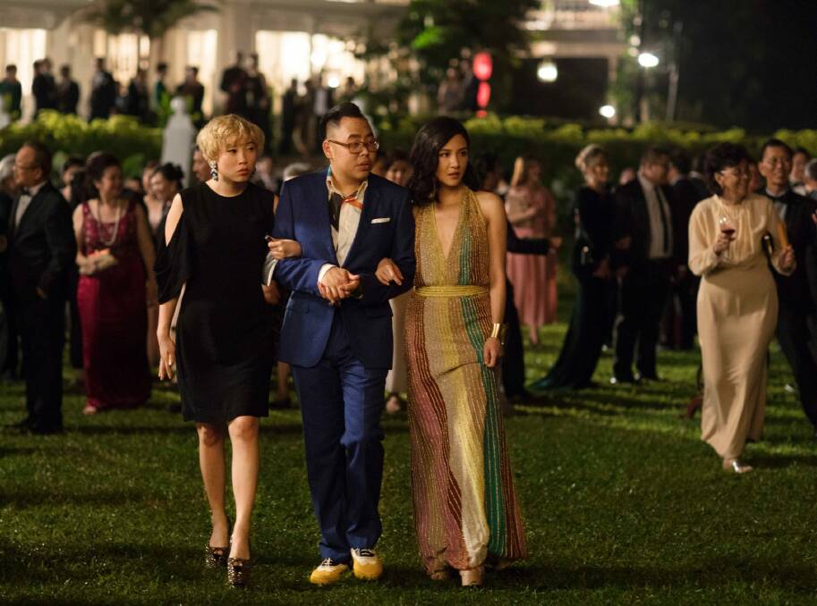 Awkwafina, Nico Santos and Constance Wu in a scene from the film "Crazy Rich Asians." Photo: AP