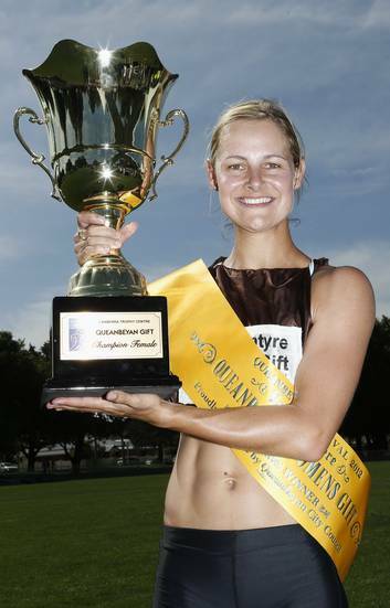 Emma Rynne with the trophy after winning the Queanbeyan Women's Gift. Photo: Jeffrey Chan