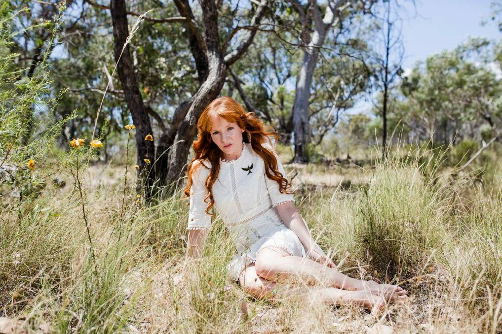Hollywood actress Stef Dawson in the calming surrounds of Farrer Ridge during a recent trip home to Canberra. She is wearing a dress by Aussie label Zimmermann. Photo: Jamila Toderas