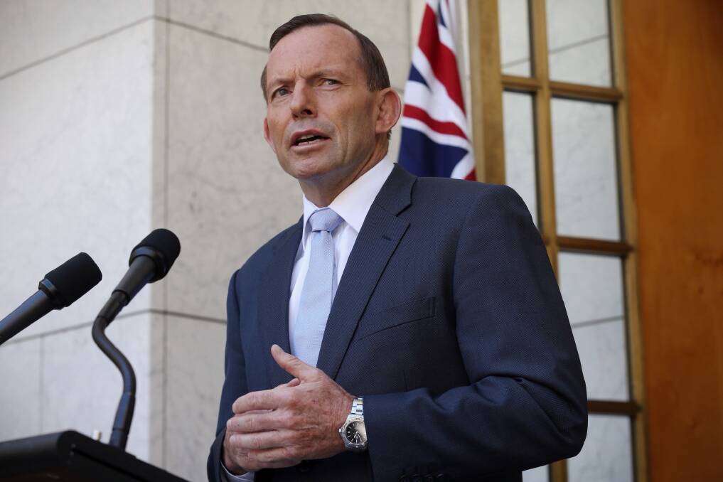 Prime Minister Tony Abbott speaks to the media about the Sydney siege on Monday. Photo: Andrew Meares