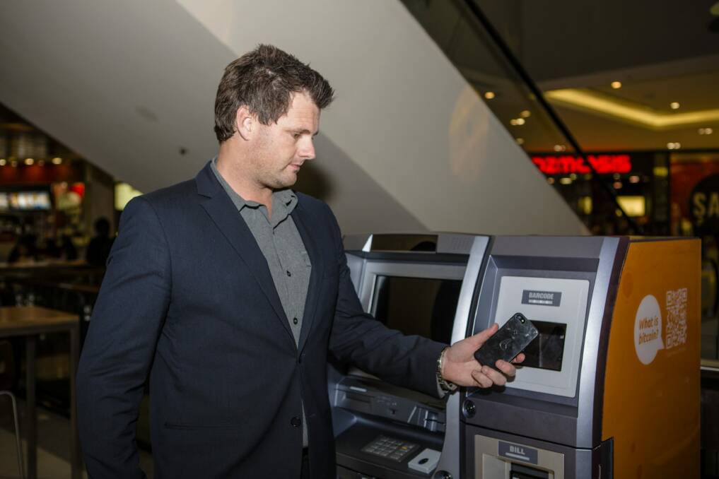 Australian Bitcoin ATMs director Robert Masters uses Canberra's first Two-Way Bitcoin ATM at Canberra Centre. Photo by: Jamila Toderas