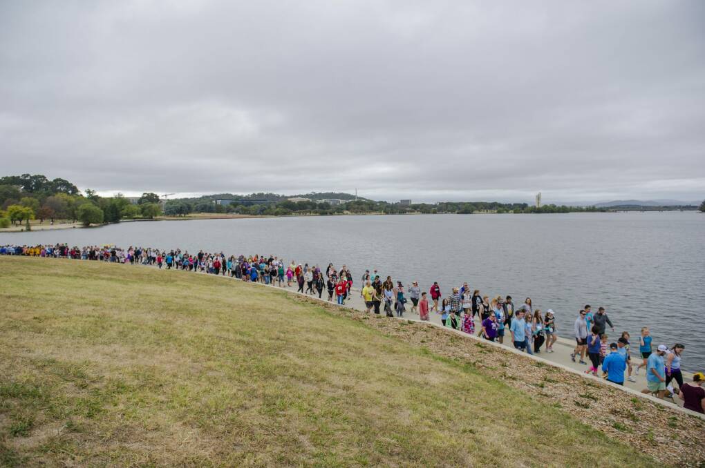 A fundraising walk at Lake Burley Griffin was held in honour of Tara Costigan. The walk also represented more than just her tragic death, but many others. Photo: Jamila Toderas