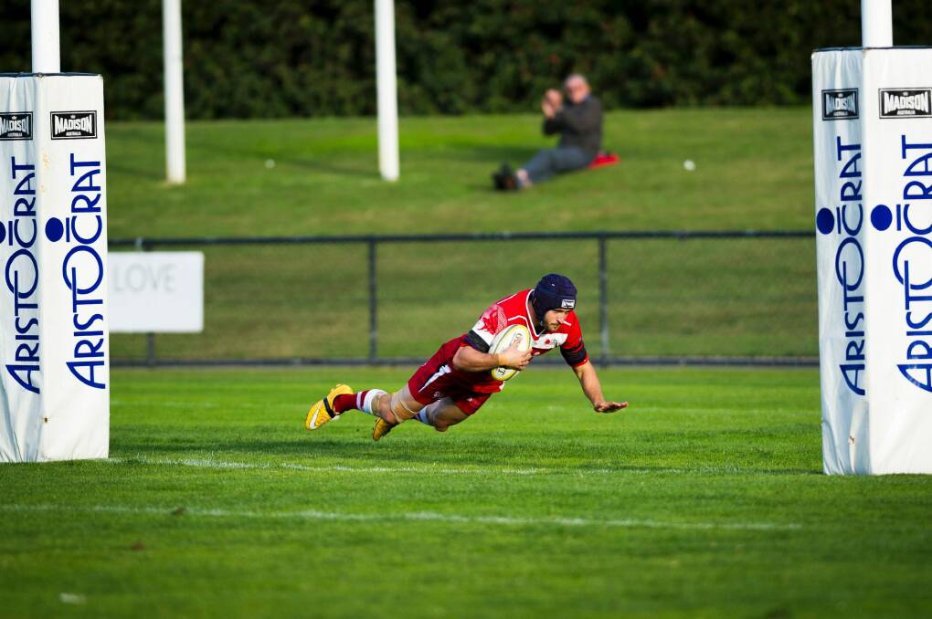 Jake Knight scores one of his two tries against Queanbeyan. Photo: Dion Georgopoulos