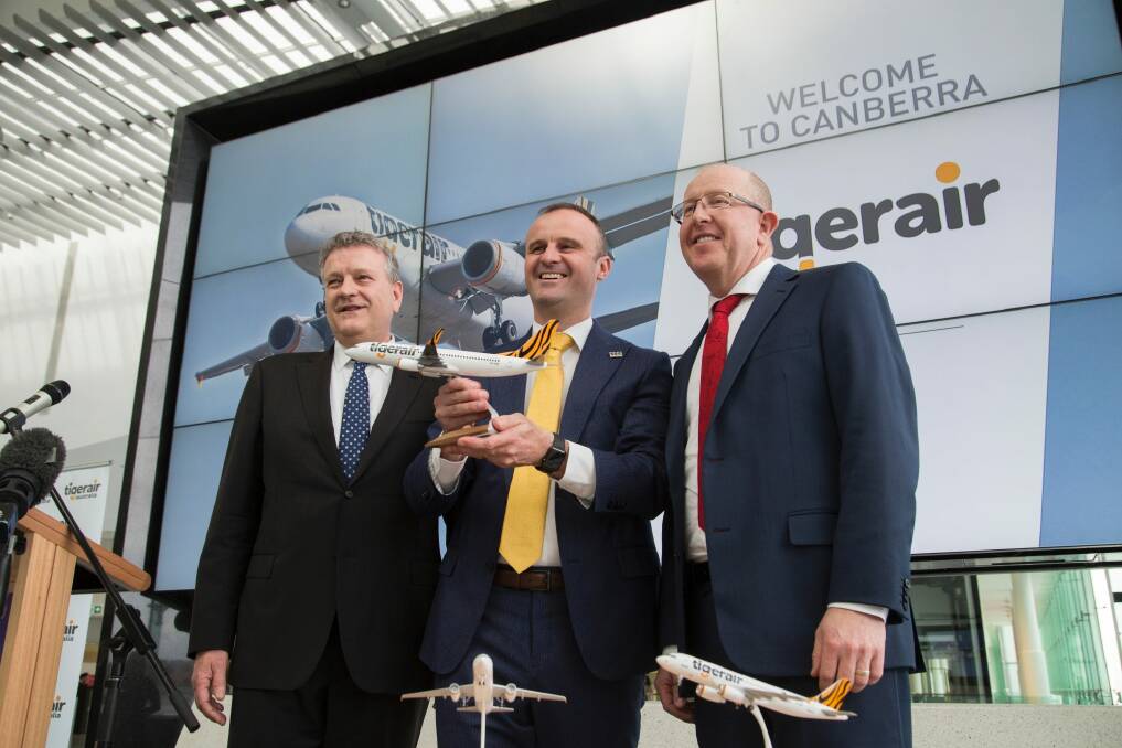Tigerair Australia chief executive Rob Sharp, left, Chief Minister Andrew Barr and Capital Airport Group managing director Stephen Byron announce the return of?Tigerair flights between Melbourne and Canberra. Photo: File picture