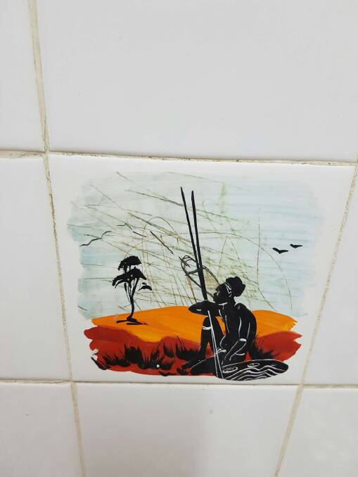 One of the tiles beside the men's urinal in the Sussex Inlet RSL that has upset ACT Labor's Bec Cody. Photo: Supplied