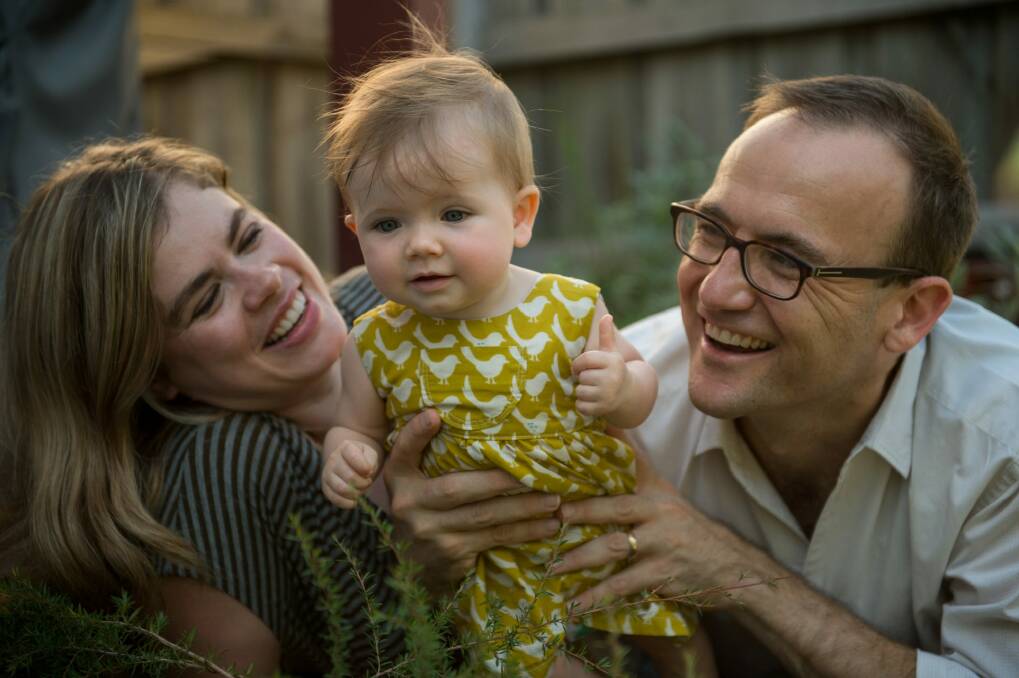 Federal Greens MP Adam Bandt with wife Claudia Perkins and their daughter Wren Perkins at home in 2016. Photo: Penny Stephens