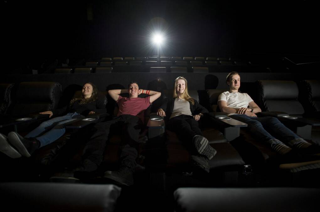 News
Hoyts is slowly rolling out across all of their ACT cinemas comfy, reclining chairs in every row of all of their cinemas. Pictured (l-r) Celeste Booth, Adam Monro, Larissa Butt and Ben Francis
The Canberra Times
Date: 29 October 2015
Photo Jay Cronan Photo: Jay Cronan