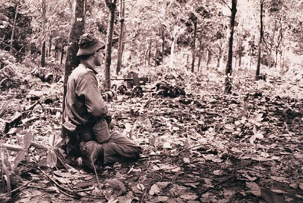 Australian soldiers during the battle of Long Tan in Vietnam. Photograph provided by the Australian War Memorial Photo: Australian War Memorial 