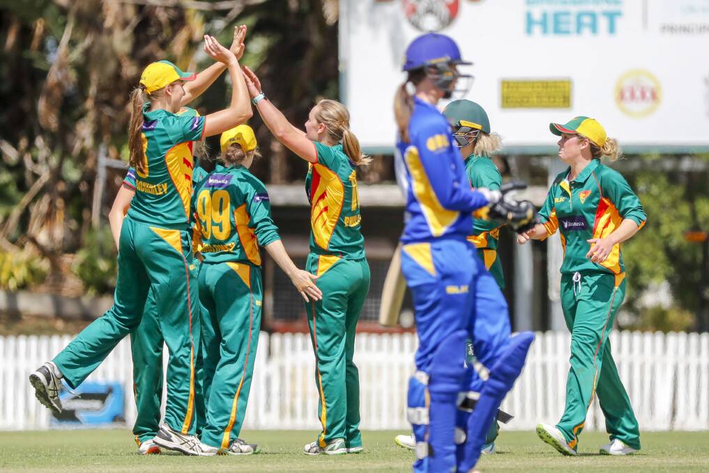 Tasmania celebrate the wicket of Zoe Cooke. Photo: Glenn Hunt