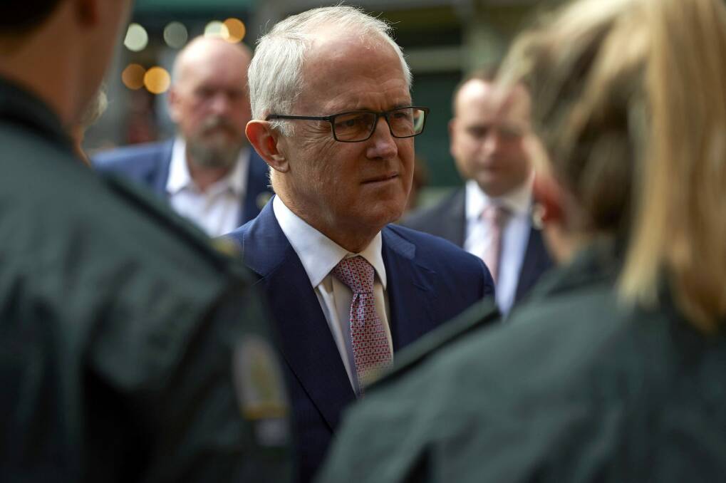 Malcolm Turnbull speaking to police and first responders in London on Monday. Photo: AP