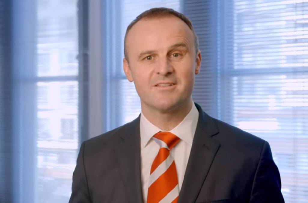 A still shot from the Labor television ad filmed from Chief Minister Andrew Barr's office, in breach of parliamentary rules.