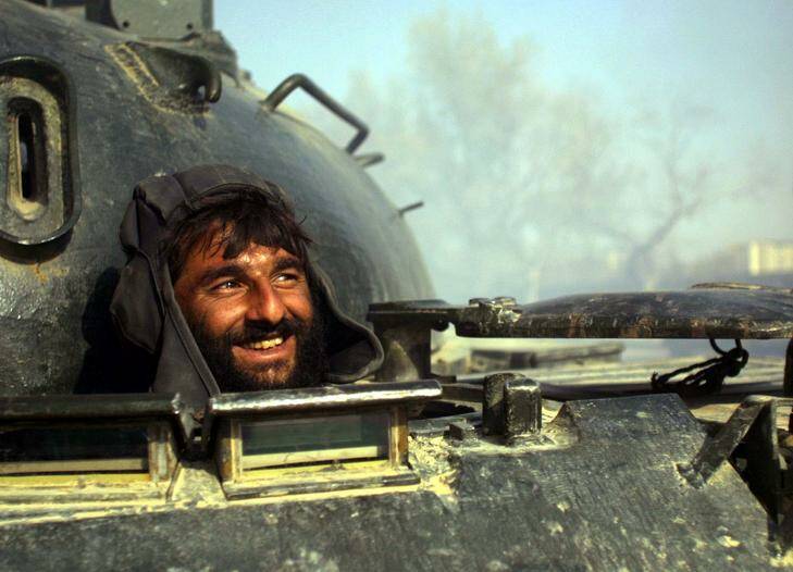 Endless conflict ... a Northern Alliance tank driver in Kabul in 2001. Photo: AP