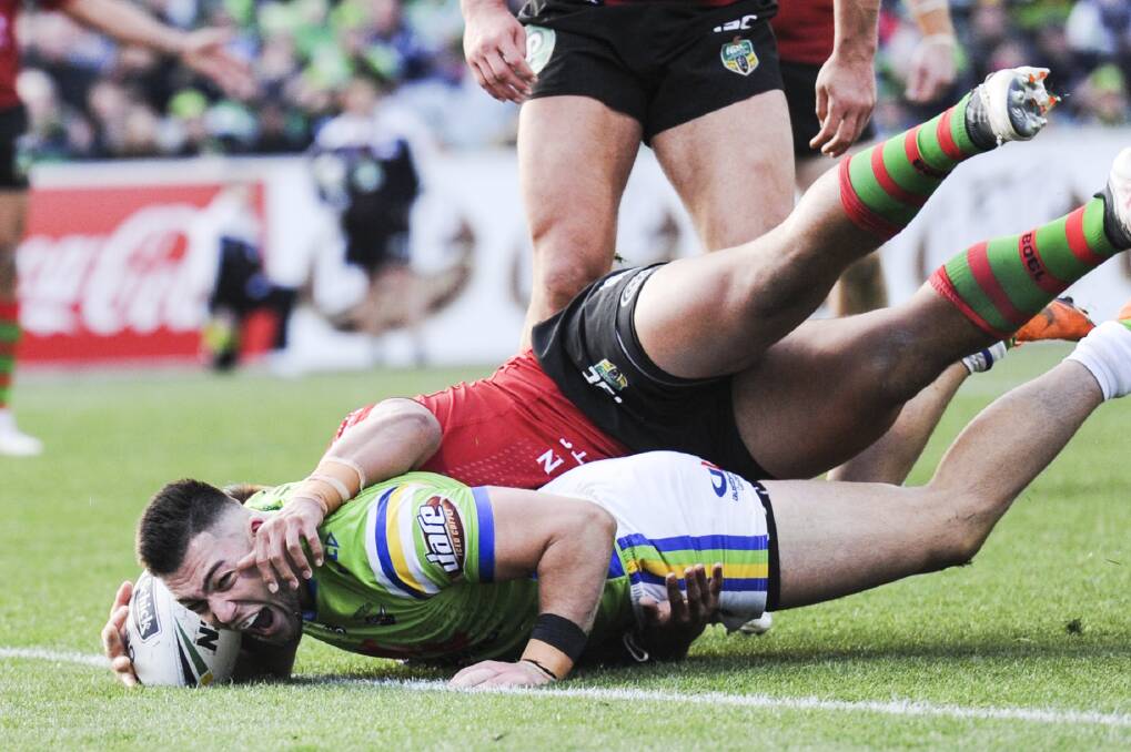 Nick Cotric of the Raiders scores the final try. Photo: AAP