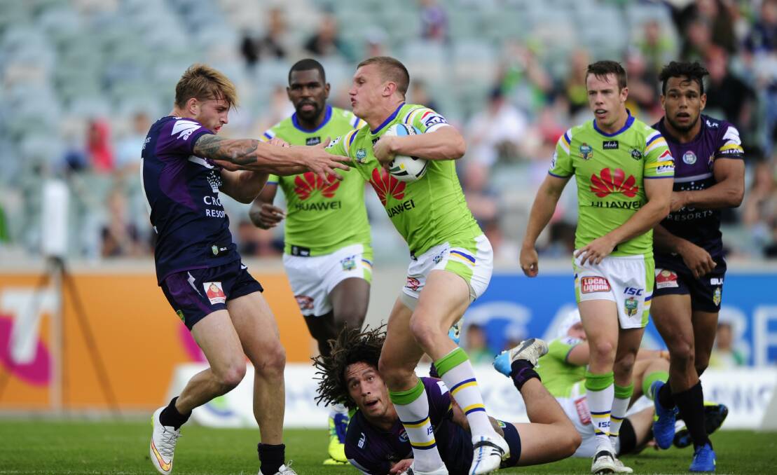 Cameron Munster and Jack Wighton clashing in 2015. Photo: Melissa Adams