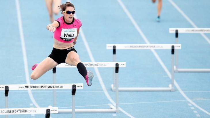 Lauren Wells in action in her 400m hurdles heat on Friday. Photo: Getty Images