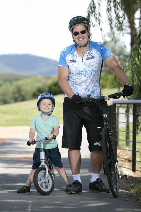 Ethan Jeffress with Senator Zed Seselja, who will participate in a bike ride on January 17 to raise awareness of juvenile diabetes. Photo: Jeffrey Chan