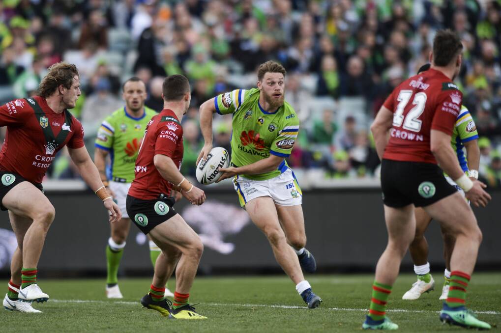 Elliott Whitehead of the Raiders looks to pass during the upset win over the Rabbitohs. Photo: Rohan Thomson