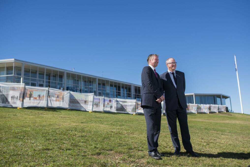 National Capital Authority boss Malcolm Snow and Visit Canberra's Ian Hill at Regatta Point on Tuesday. Photo: Rohan Thomson