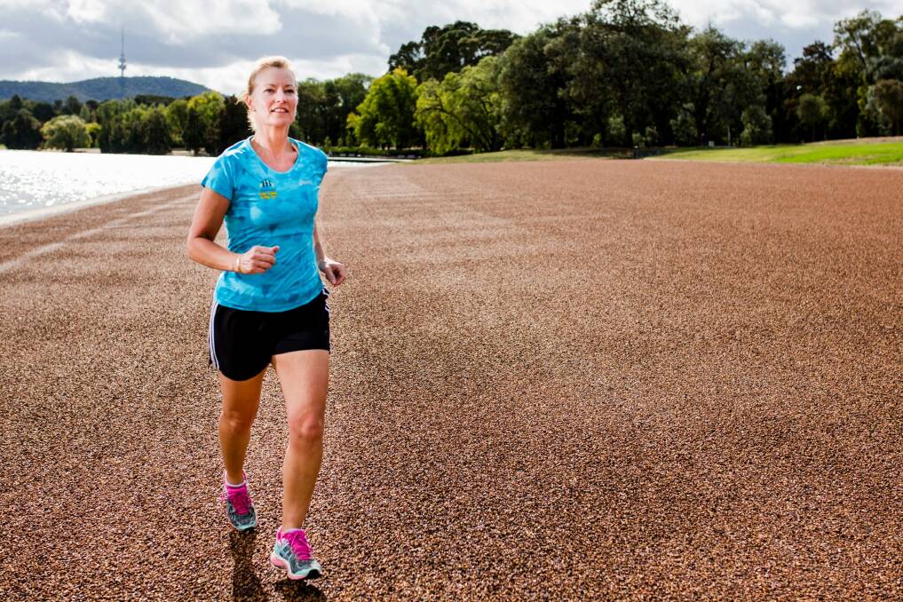 Wendy Smith of Harrison is training for her first marathon at the Australian Outback Marathon on red dirt around Uluru. Photo: Jamila Toderas