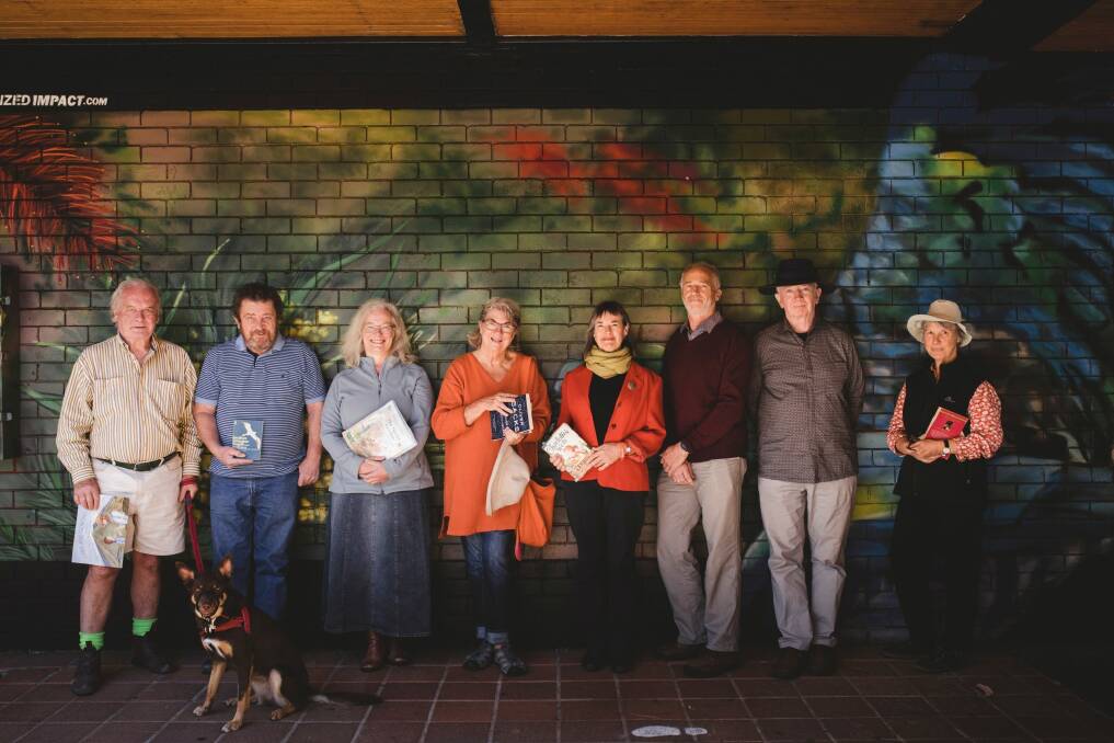 It's been one year since the ACAT tribunal retired to consider their appeal against the redevelopment of a Dickson car park into a Coles supermarket and apartment complex. From left, John Carroll, Denis O'Brien, Rosemary Urquhart, Robin d'Arcy, Jane Goffman, Ron Brent, Paul Costagan, and Jacqui Pinkava.  Photo: Jamila Toderas