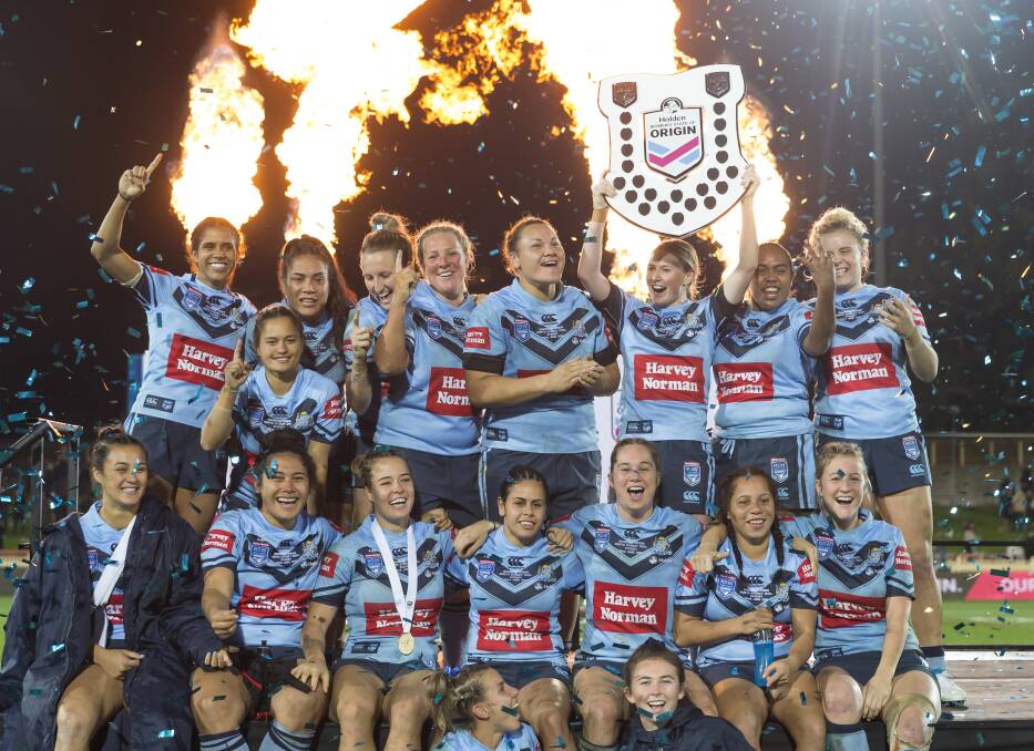That's one: NSW celebrate their victory in the inaugural Women's State of Origin match. Photo: AAP