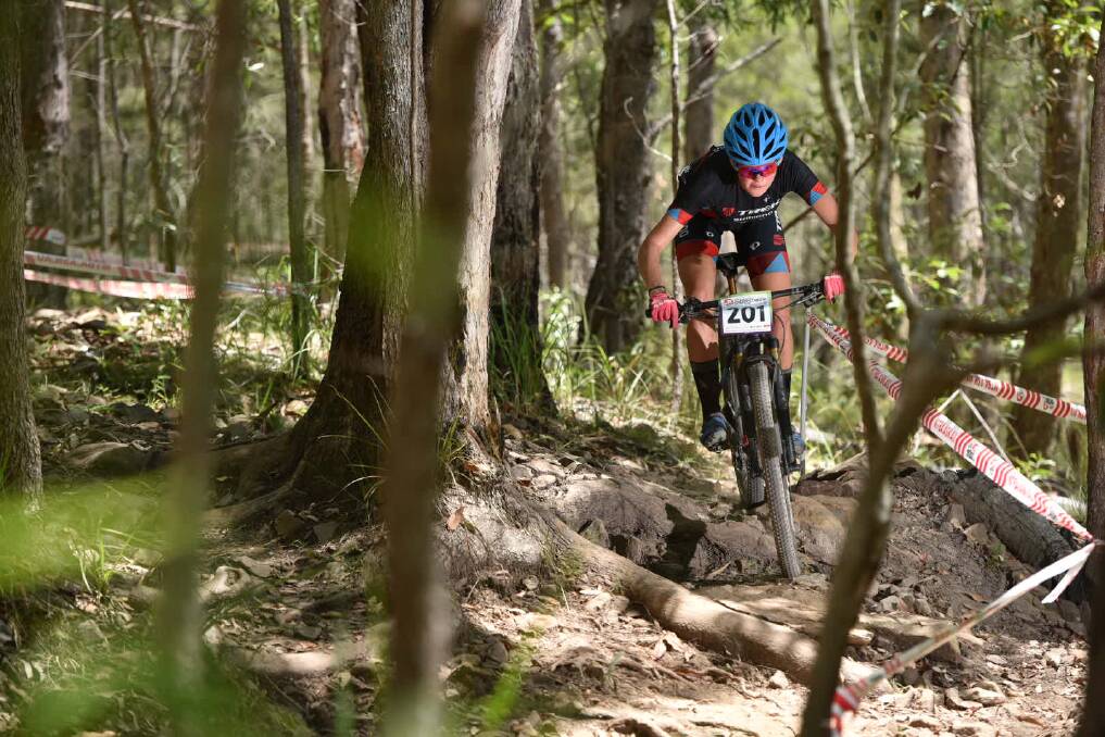 Canberran Zoe Cuthbert taking the mountain by force. Photo: Element photo and video production