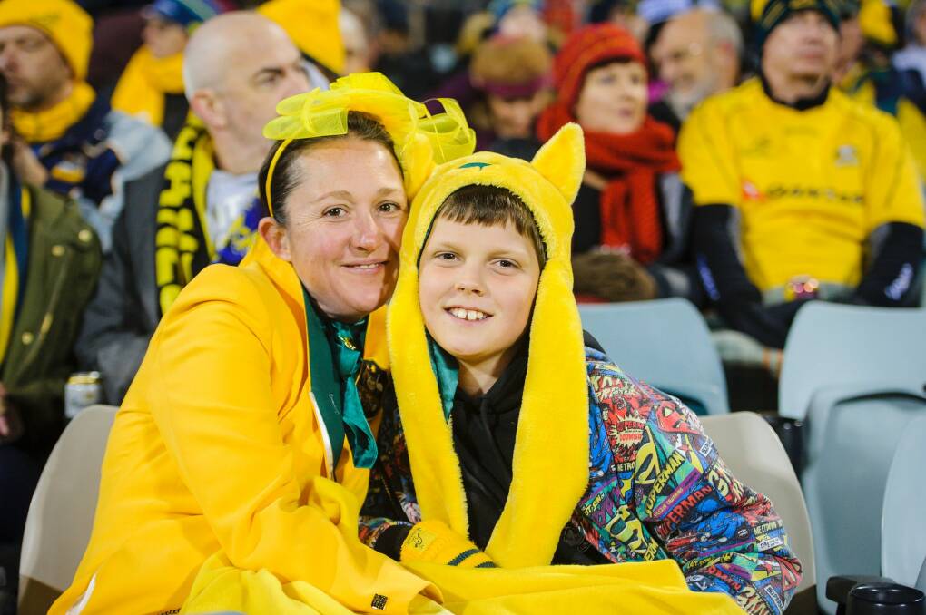 Zoe and nine-year-old Ben Hancock from Holder enjoy the Wallabies game at Canberra Stadium. Photo: Sitthixay Ditthavong