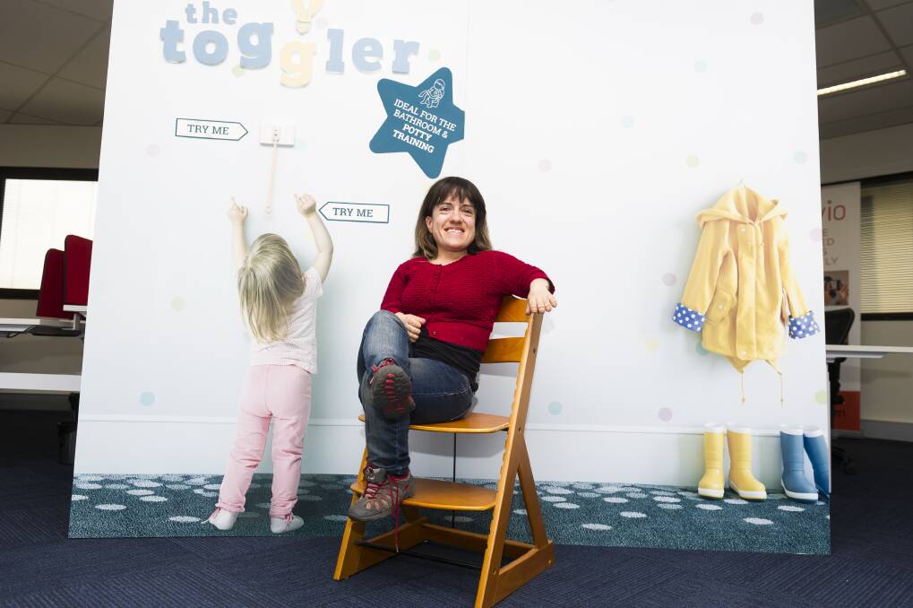 Peta Stammell in front of The Toggler, which acts as a light switch extender for children or adults. Photo: Dion Georgopoulos