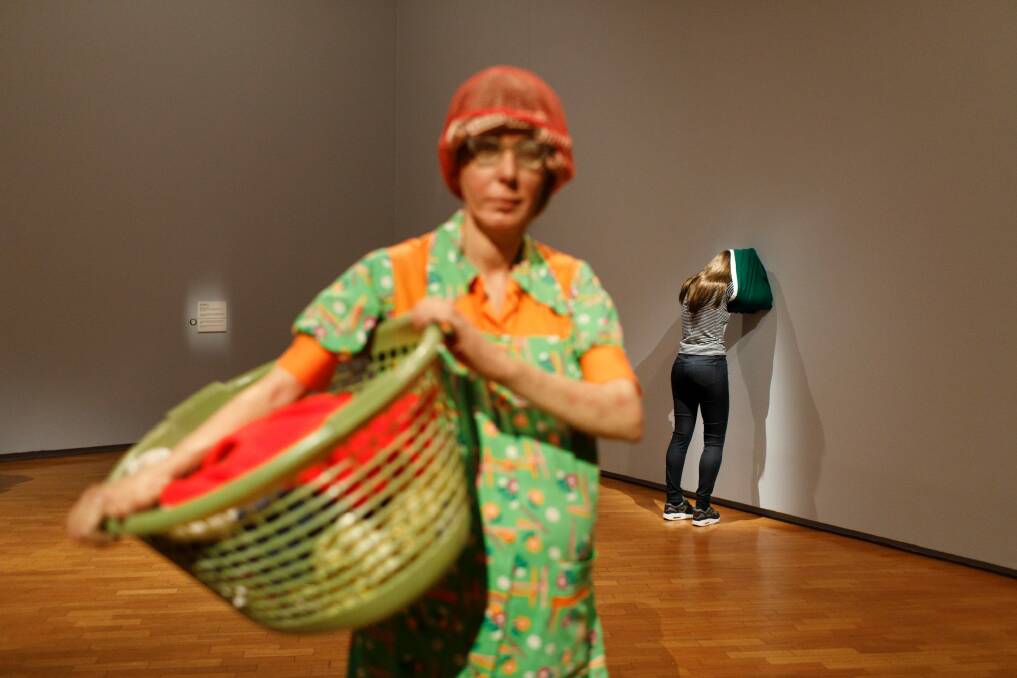 'Woman with a laundry basket' by American artist Duane Hanson.  Photo: Sitthixay Ditthavong