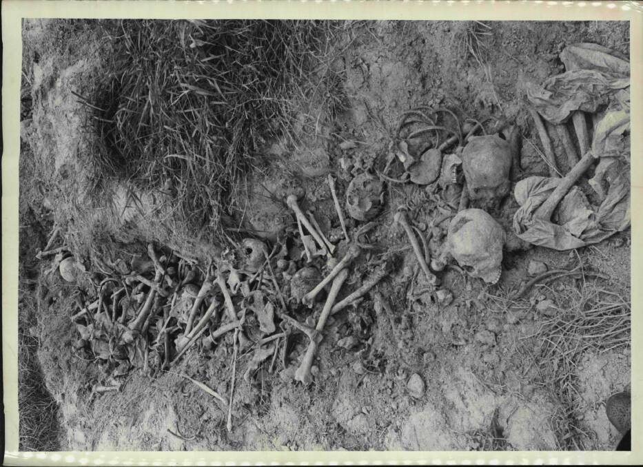 In open trenches are the skulls and bones of some of the thousands murdered by the Khmer Rouge. Photo: Archives