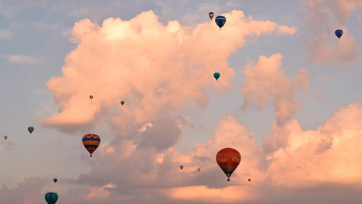 The peaceful scene of balloons floating in the Canberra sky. Photo: Claire Lander