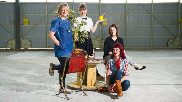 Belinda Neame, founder of The Forage, left, Tegan McAuley, founder of Hustle & Scout, Brie Norton of B St Bakery and  Netti Vonthethoff of April's Caravan  take up residence at their new home in a disused hanger at Fairbairn RAAF base. Photo: Jay Cronan
