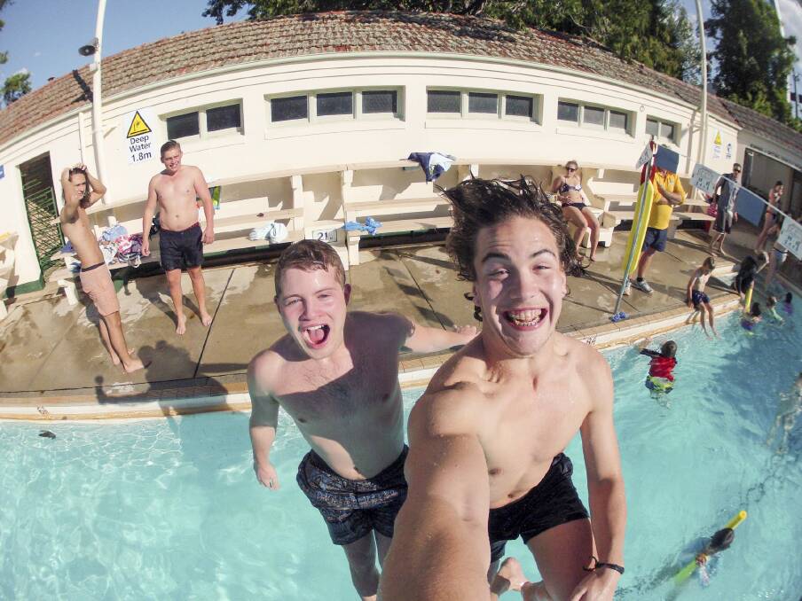 Friends Jordan Trkulja, Brayden Slobone,  Nathan  Andrews and Sam Irvine Cool off at Manuka pool. Photo: Jay Cronan
