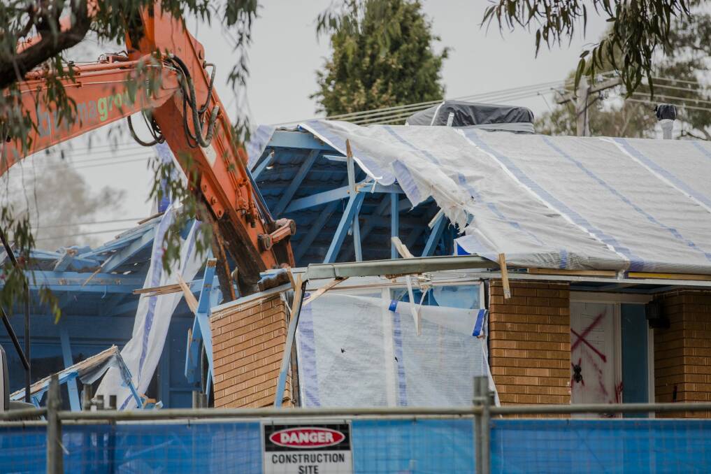 The first Mr Fluffy house demolition in July 2015, in Wanniassa. Photo: Jamila Toderas