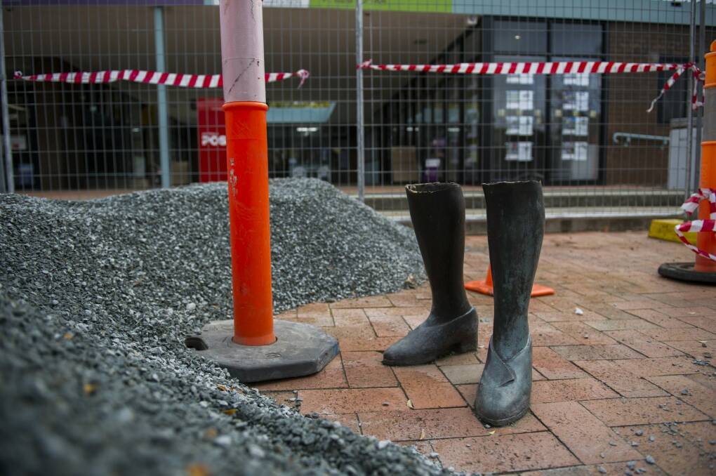 All that remains of the sculpture at the Hughes shops after the lady was cut off below the knees over the weekend. Photo: Rohan Thomson