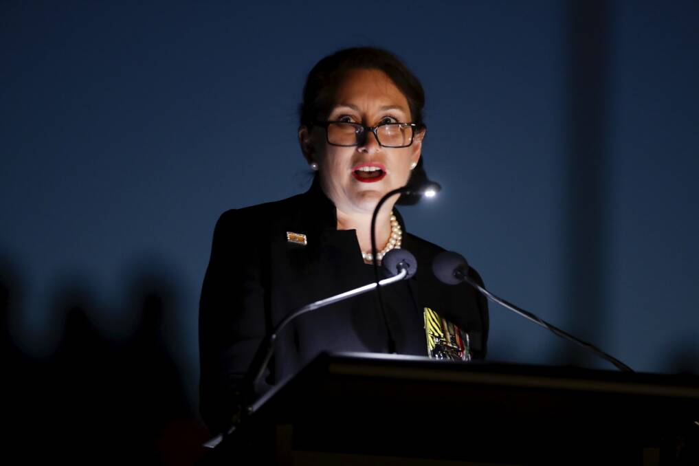 Retired Colonel Susan Neuhaus delivers the dawn service address at the Australian War Memorial. Photo: Alex Ellinghausen