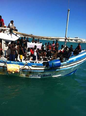 Long journey: Sri Lankan asylum seekers arriving at the port of Geraldton on Tuesday. Photo: Supplied