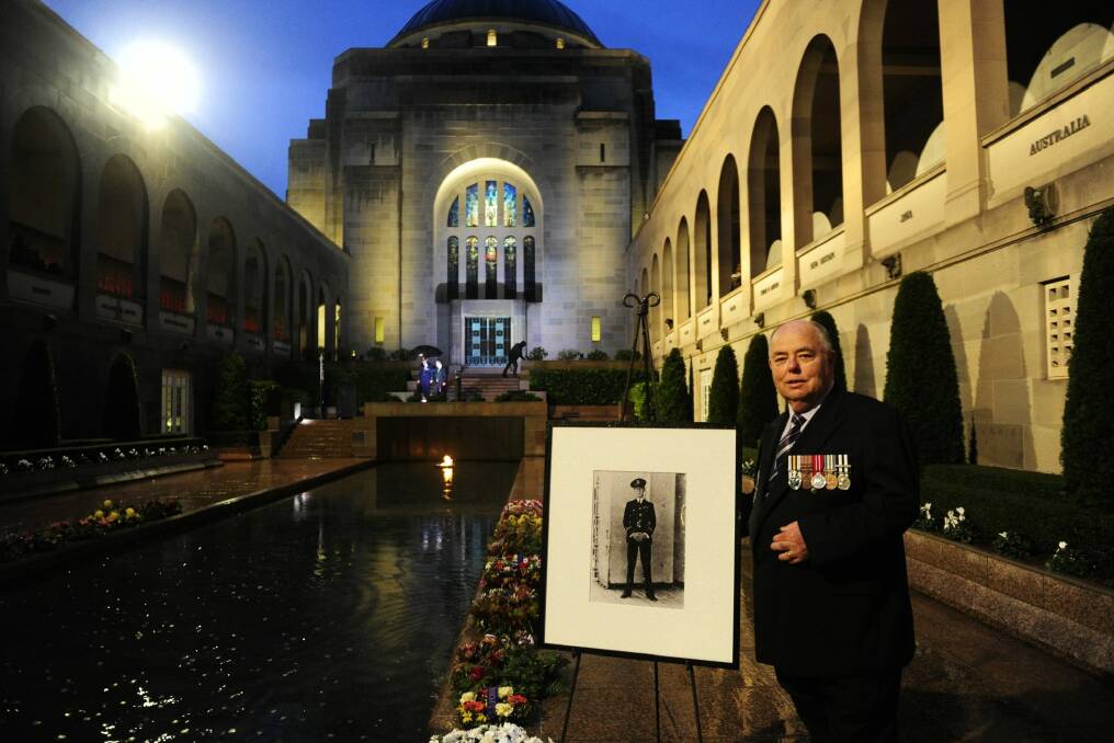 Representing the Bell family is Alan Hall of Melbourne after the Last Post ceremony at the Australian War Memorial in Canberra for Flight Lieutenant John Napier Bell. Photo: Melissa Adams