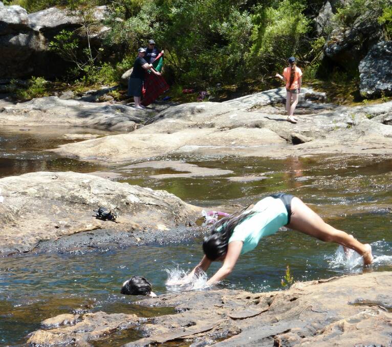 Cooling off at Carrington Falls. Photo: Tim the Yowie Man