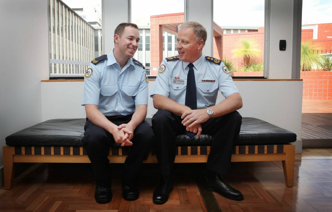 Tony Graham, right, with ACT SES member Adam Manning at the 2010 Community Protection Awards. Photo: Andrew Sheargold